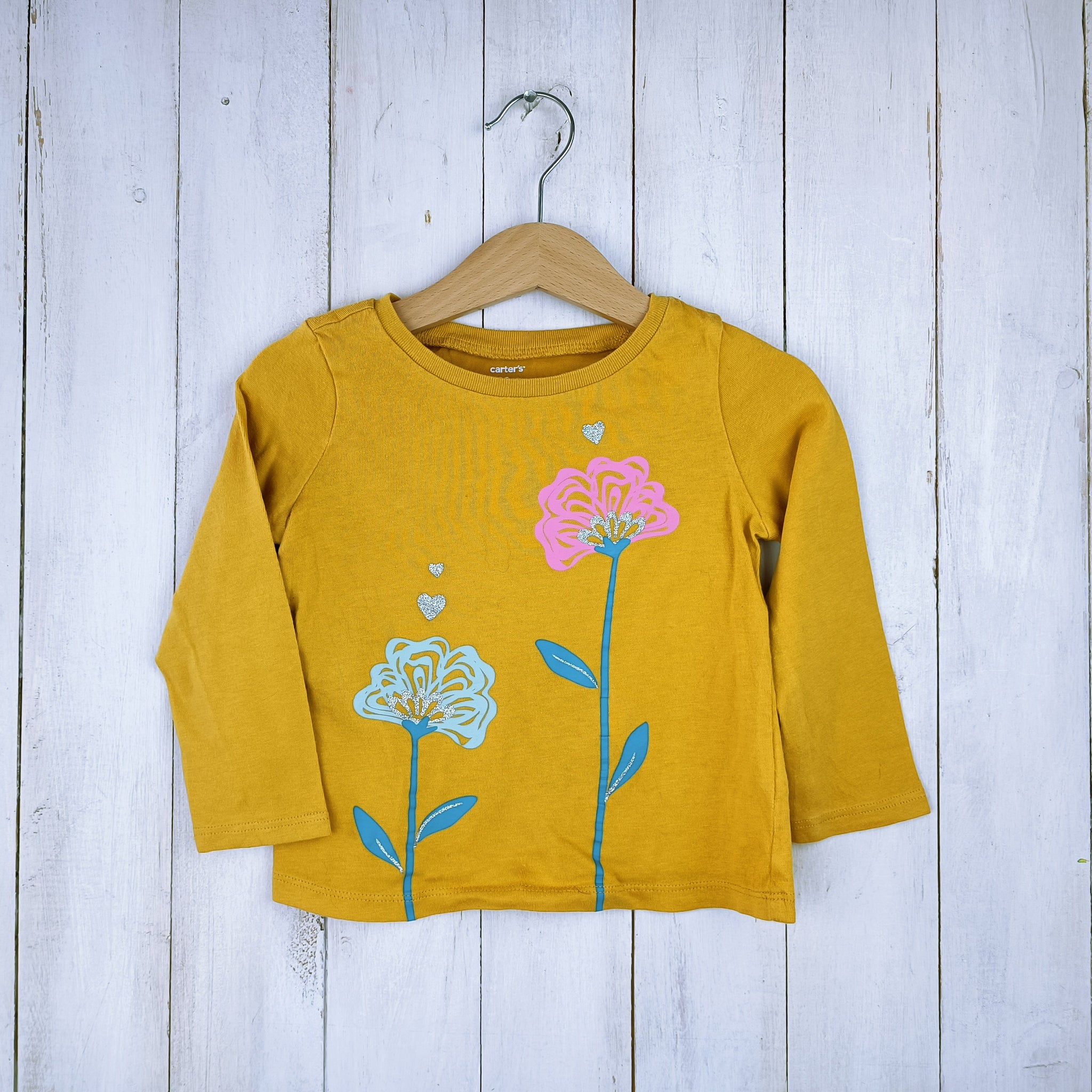 Polera Carter´s Talla 2 años Amarillo mostaza. Dos flores.