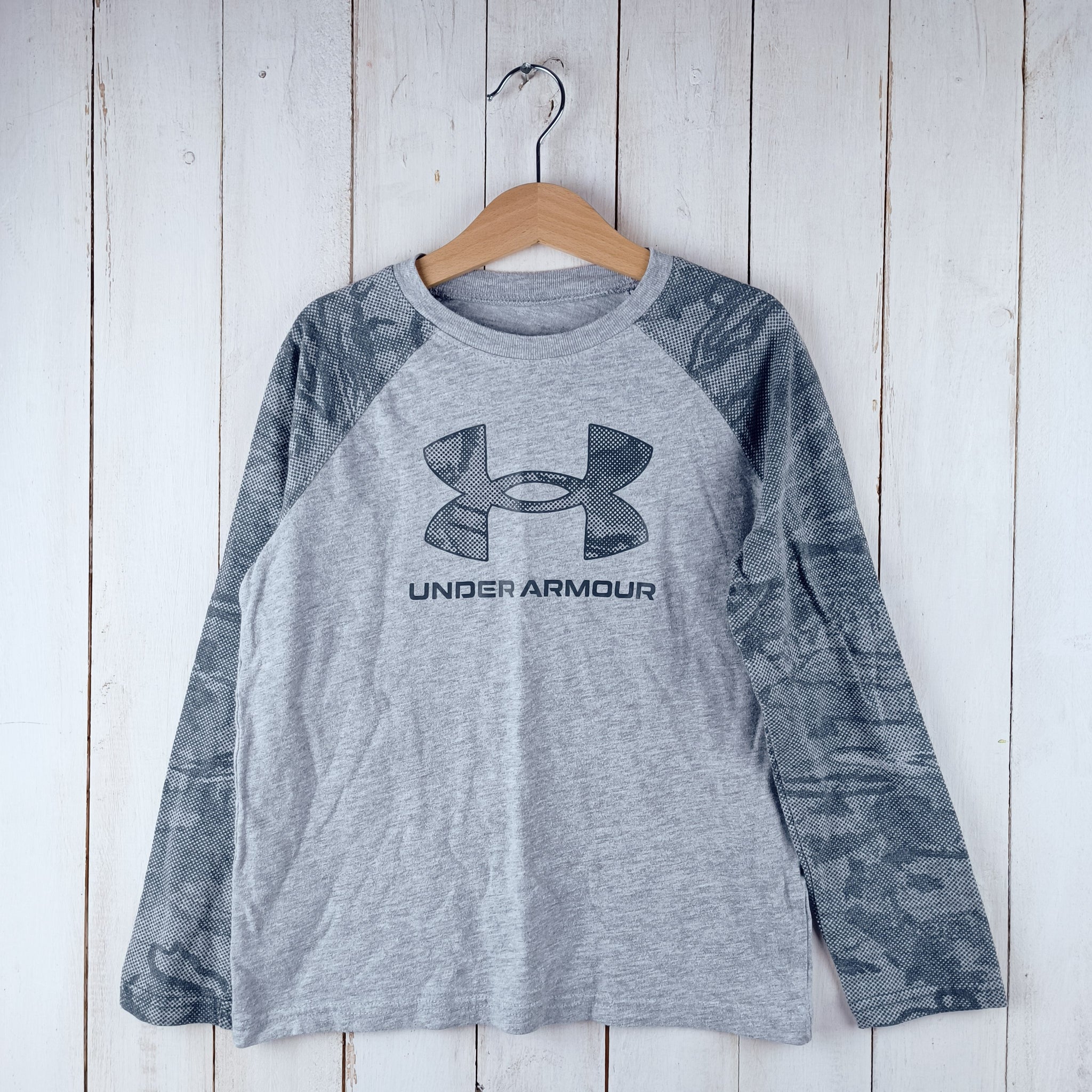 Polera Under Armor T8 Gris Claro