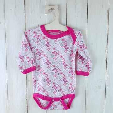 NUEVO Body Talla 6-9 meses Blanco. Mariposas, flores y hojas rosadas