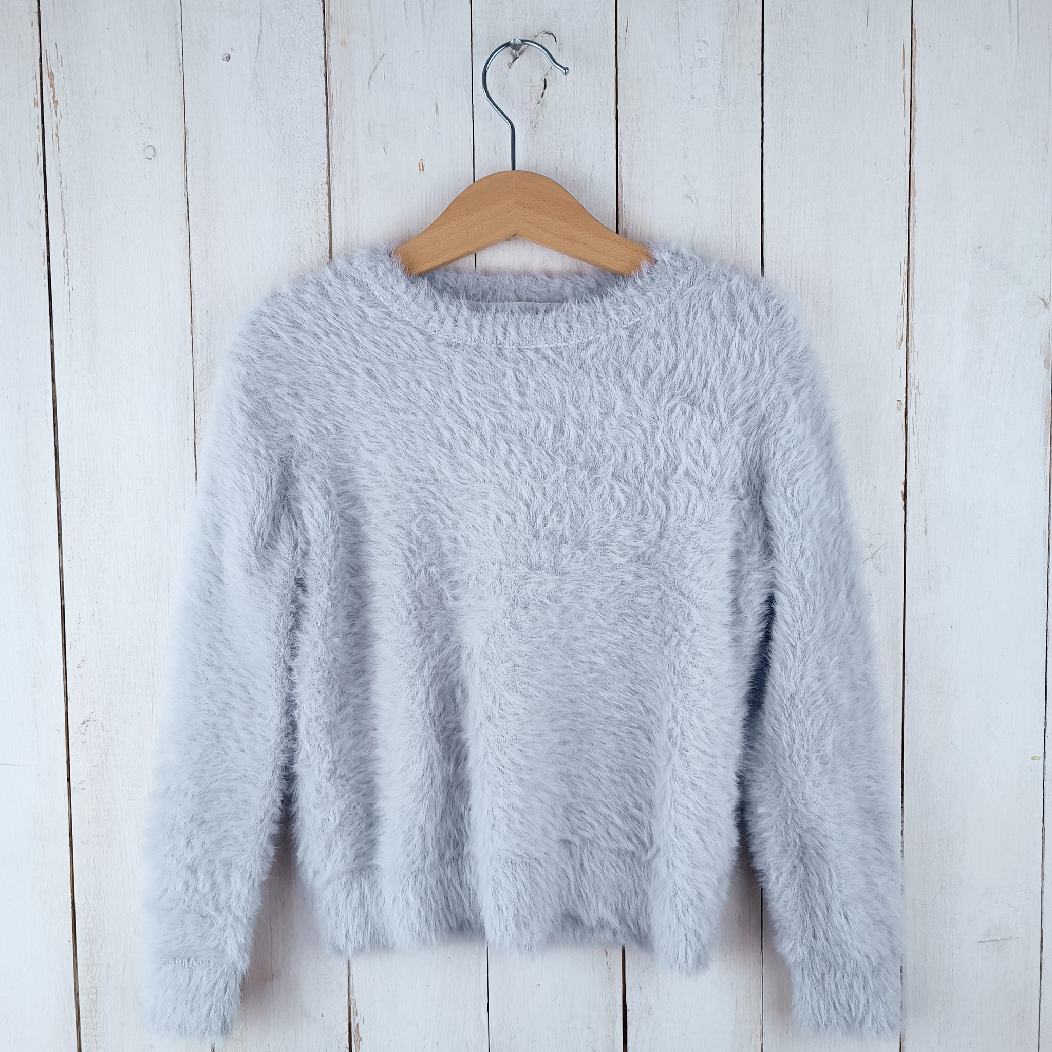 NUEVO Sweater Terranova Talla 4-5 Gris Claro.