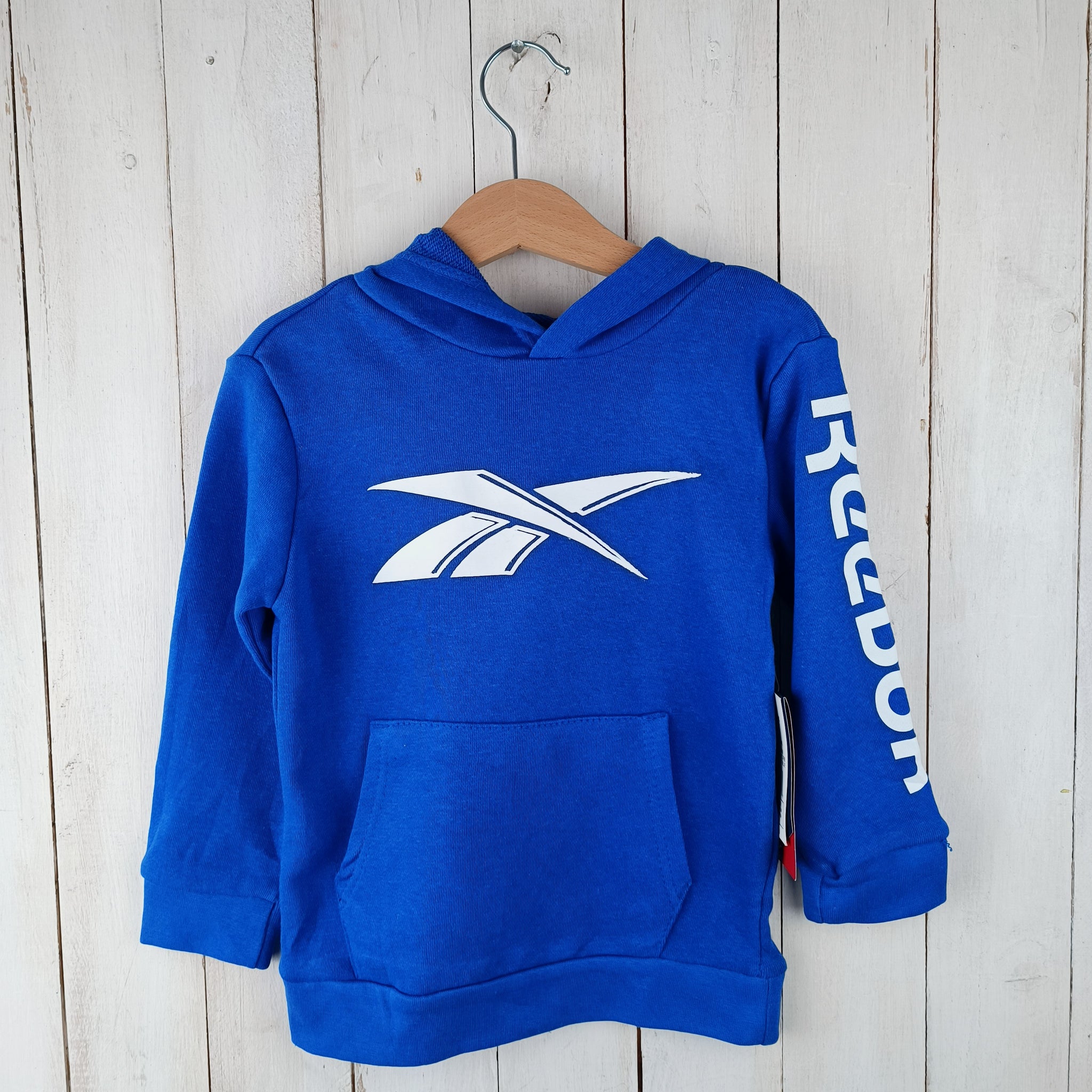 NUEVO Polerón Reebok Talla 2-3 Azul. Logo