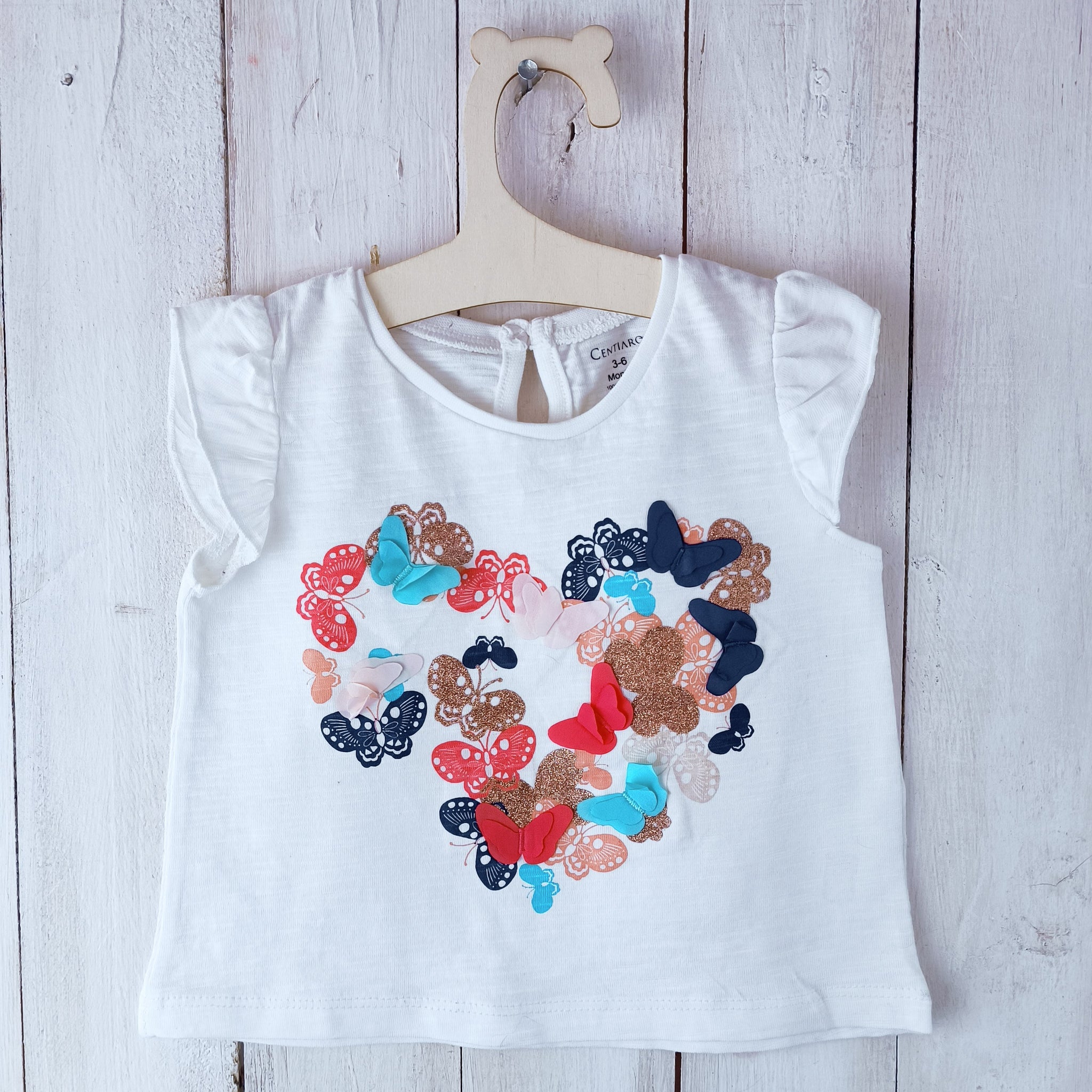 Polera Centiaro Talla 3-6 meses. Blanca Invierno. Mariposas