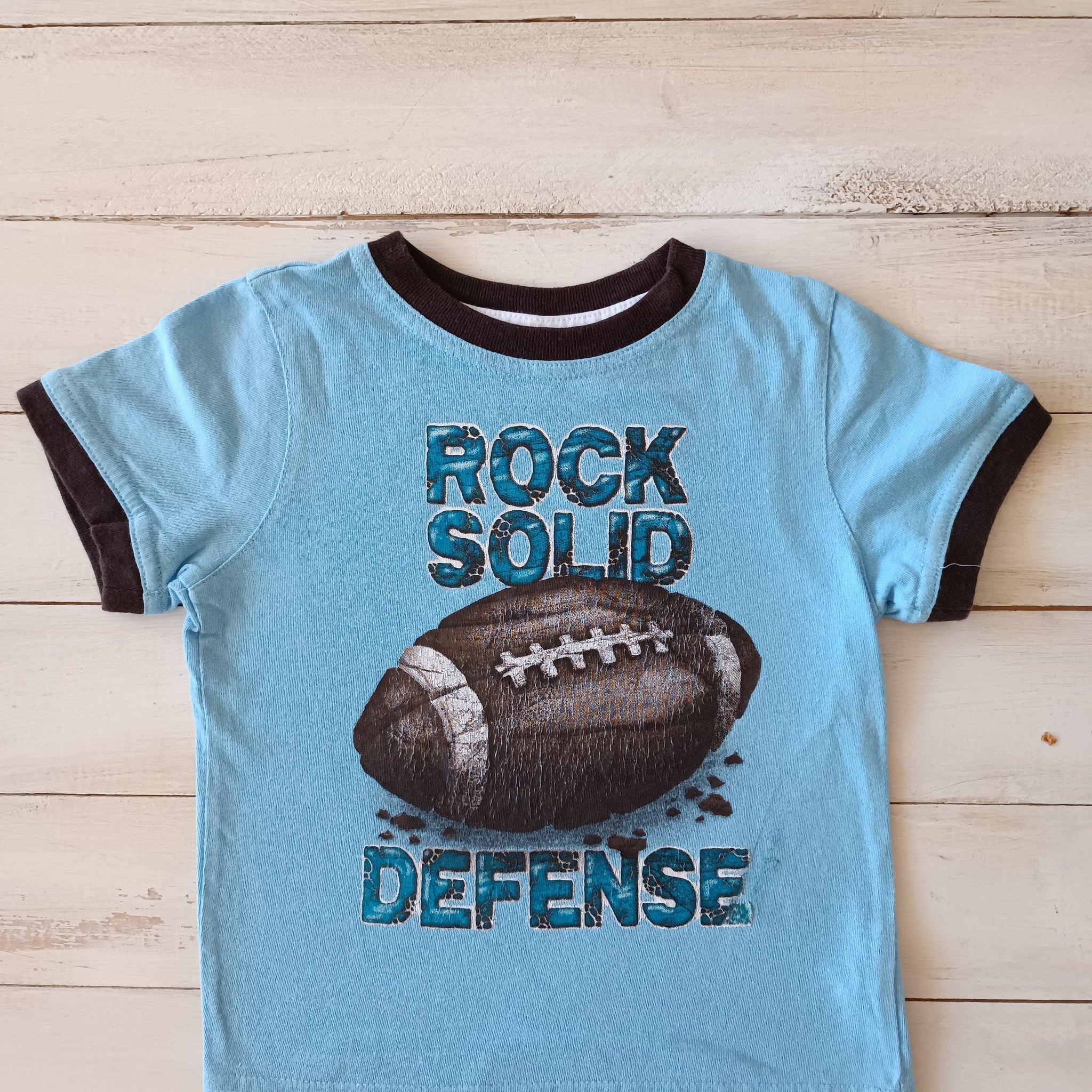 Polera Jumping Beans Talla 2 Celeste. Pelota baseball