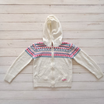 Chaleco Mini Girl T6 Blanco invierno. Pecho y hombros figuras geométricas celestes y rosadas