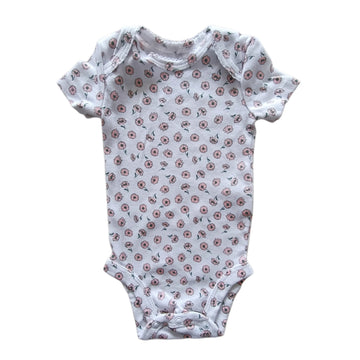 Body Carter´s 0-3M Blanco. Flores rosadas.