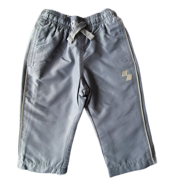 Pantalón Buzo Place Sport 9-12M Azul grisaseo. Logo en blanco.