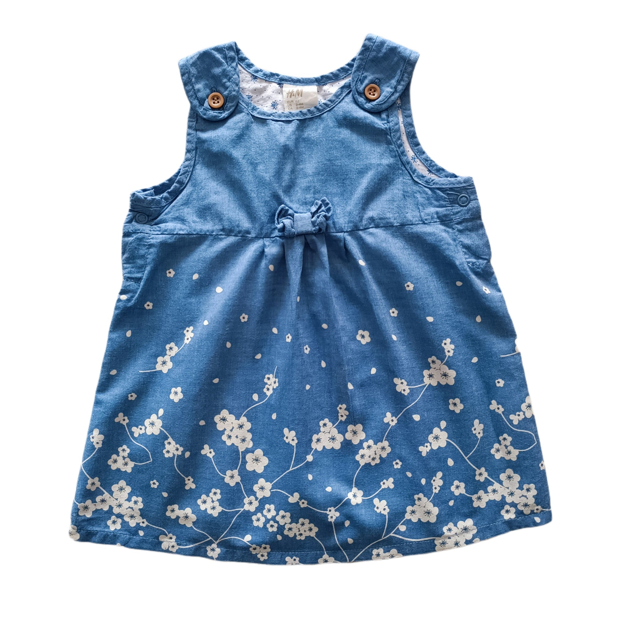 Vestido H&M 3-6M Celeste. Flores blancas. Forrado